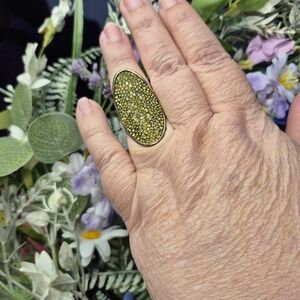 Henri Bendel Unique Gold Oval Ring with Sparkly Green Stone